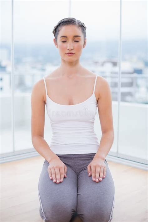 Relaxed Sporty Brunette Sitting Stock Photo Image Of Sporty Healthy