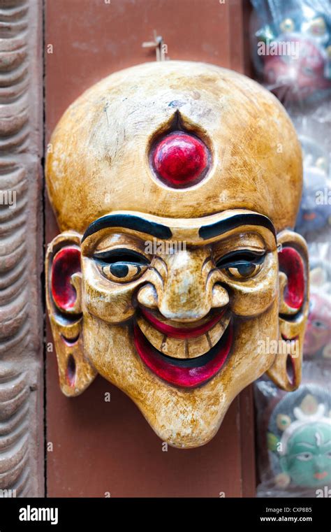 Colorful Buddhist Mask On A Temple Wall Stock Photo Alamy