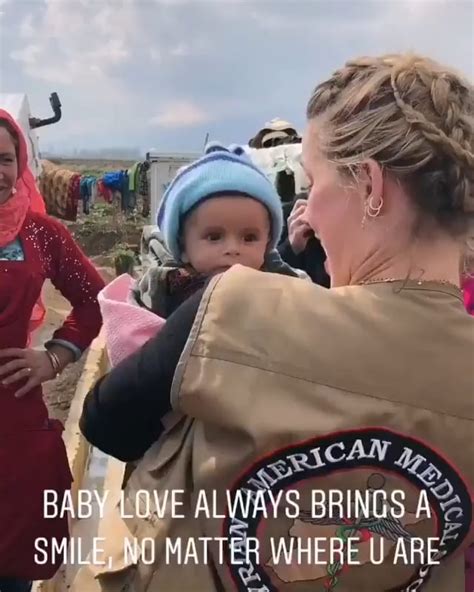 Amber Heard with a cute little baby during her 2019 humanitarian ...