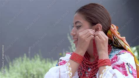 Cinematic clip of a young brunette latin girl wearing the traditional outfit named Cayambeñas