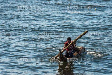 The Fisherman Goes To Sea On A Traditional Peruvian Small Reed Boats