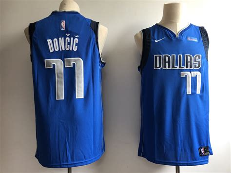 A Pair Of Blue Basketball Jerseys On Mannequins