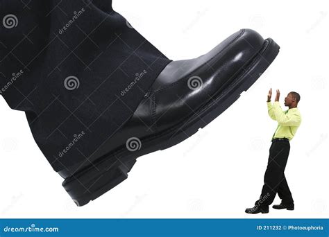 Businessmans Foot Stepping Stomping Out The Competition Stock Photo