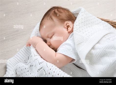 Cute Newborn Baby Sleeping In Basket At Home Stock Photo Alamy