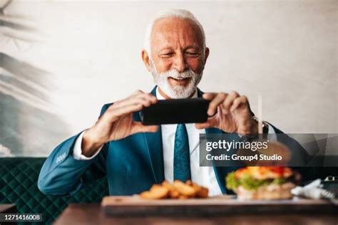 Cheesy Business Man Photos And Premium High Res Pictures Getty Images