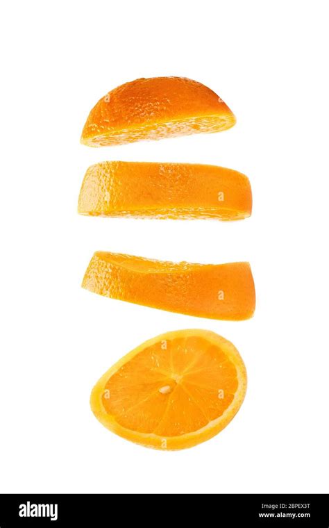 Sliced orange floating on white background. Fruit slice falling on ...