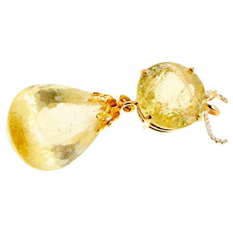 AJD Translucent Sparkling 32.8 Cts Yellow Beryl Swinging Gold Pendant
