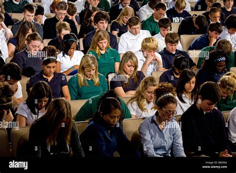 High School And Middle School Students Seated In An Auditorium Stock