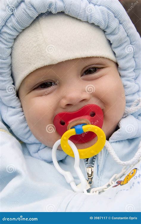 Smiling Baby With Pacifier Royalty Free Stock Photography Image