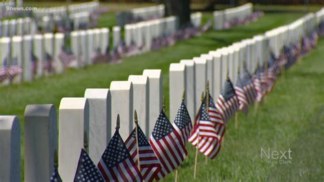 Colorado mom places flags at Fort Logan National Cemetery | 9news.com