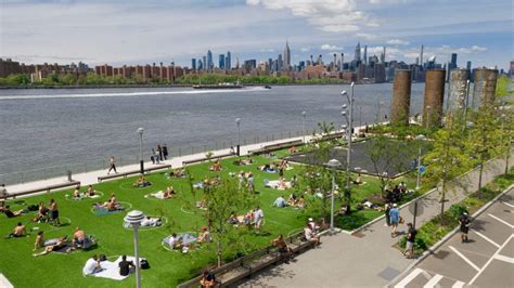 White Circles Promote Social Distancing On Domino Park Grass In New York