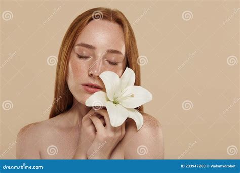 Redhead Girl With Naked Shoulders Hold Lily Flower Stock Photo Image