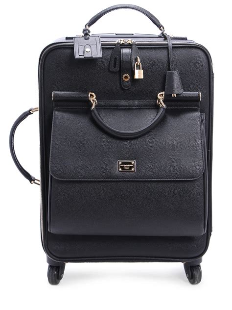 Чемодан кожаный от DOLCE & GABBANA за 285 600 рублей со скидкой 20% ...