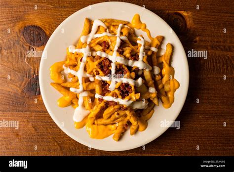 Bacon cheese fries Stock Photo - Alamy