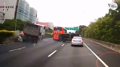 Driver Miraculously Survives Being Crushed By Truck On Taiwan Freeway