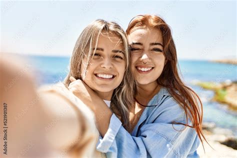 Young Lesbian Couple Of Two Women In Love At The Beach Beautiful Women