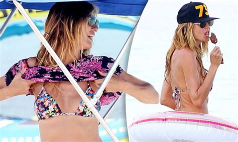 Heidi Klum Flaunts Her Supermodel Figure In A Tiny Bikini Daily Mail Online