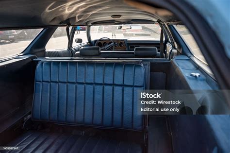 Interior View Of Classic Long Station Wagon With Woodveneered Doors Its A Blue Ford Gran Torino ...