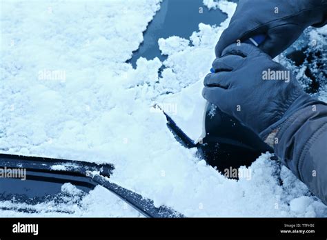 Removing Snow From Car Windshield Closeup Stock Photo Alamy