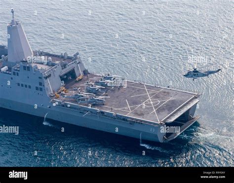 An Indian Navy UH 3H Helicopter Approaches To Land On The Flight Deck