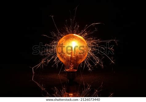 Edison Lightbulb Sparks Emitting Exploding Effect Stock Photo