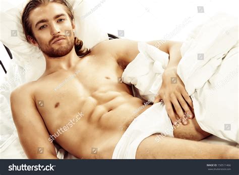 Handsome Nude Man Lying Bed Isolated Stock Photo 150511466 Shutterstock