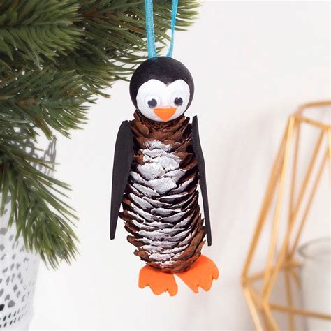 Pine Cone Penguin Baker Ross Pine Cone Crafts Christmas Crafts