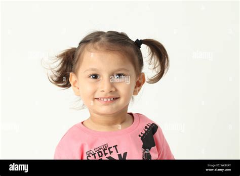 Girl smiling isolated on white background Stock Photo - Alamy