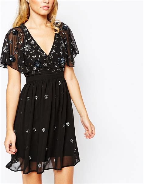 Frock And Frill Wrap Front Embellished Skater Dress With Fluted Sleeve