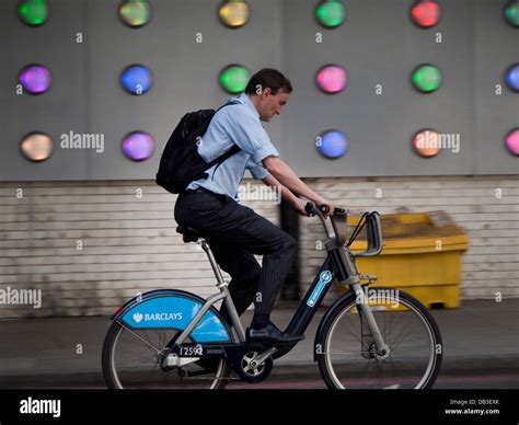 Riding a bike in London Stock Photo - Alamy