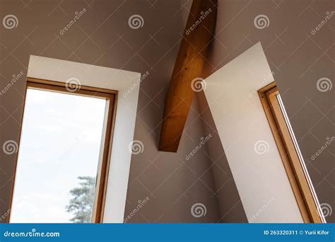 Mansard Windows In A Modern Interior White Siding And Blue Sky In A