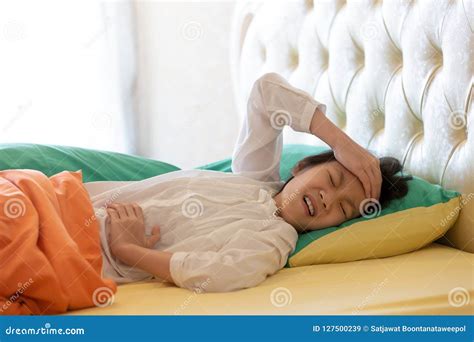 Asian Girl Feeling Sick Female Having Stomachache Headache And H Stock Image Image Of Bedroom