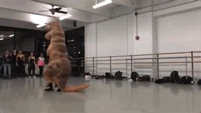 This viral video of a guy in the giant T-Rex costume dancing in "A ...