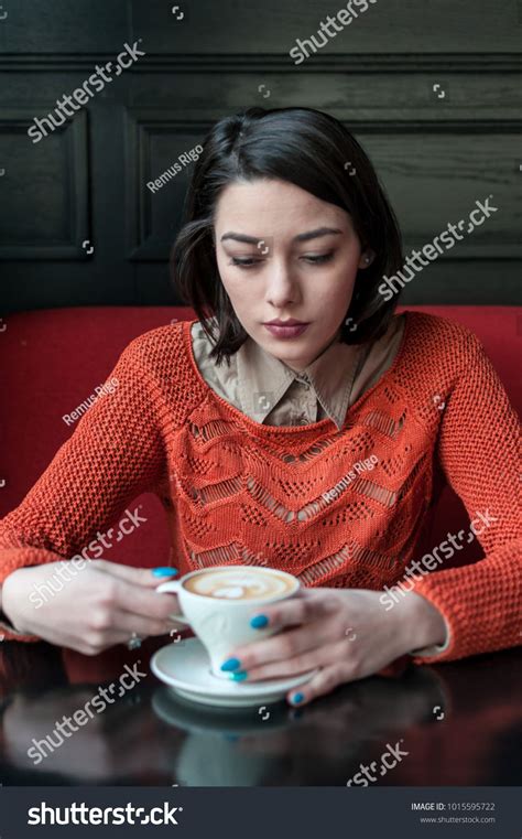 Woman Sitting At The Table And Drinking Coffee Real Poeple Female Pose Reference Sitting