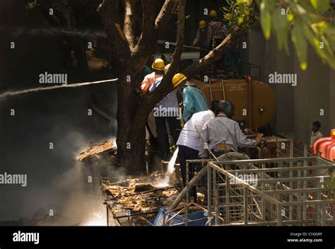 Firefighters During A Rescue Operation Gurgaon Haryana India Stock