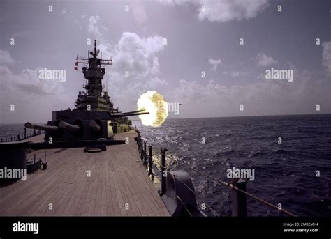 The battleship USS IOWA (BB-61) fires a round from its No. 2 Mark 7 16 ...