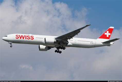 HB JNJ Swiss Boeing 777 3DEER Photo By Suparat Chairatprasert ID