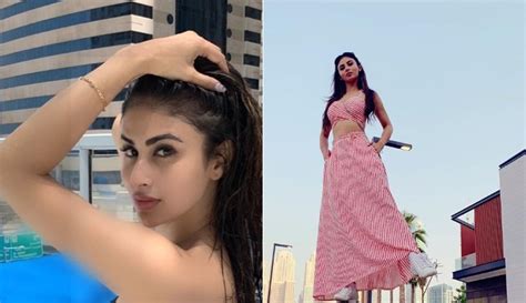 Mouni Roy Enjoys Summertime In A Monochrome Swimsuit Posing By The Poolside Celebrities News