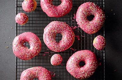 Raspberry glazed ring doughnuts | Ring doughnut recipe, Doughnut recipe, Waitrose food