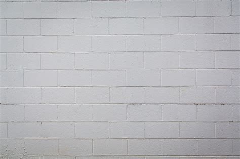 Cinder Block Concrete Exterior Wall Painted White On The Outside Of A