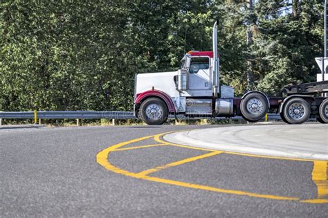 Heavy Duty White And Red Classic Day Cab Big Rig Semi Truck