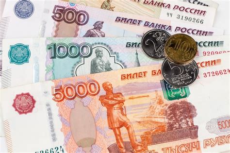 Premium Photo | Russian rubles banknotes and coins.