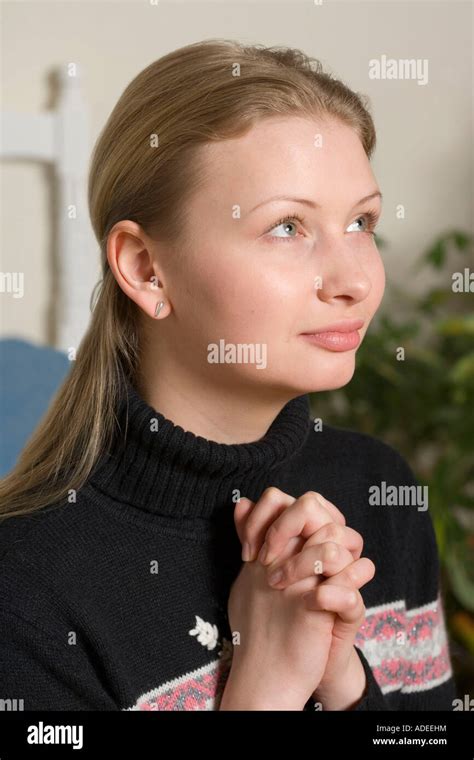 Young Woman Saying Her Prayers Stock Photo Alamy