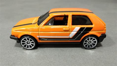 Машинка Базова Hot Wheels Volkswagen Golf MK2 Then and Now 1 64 FJX92 Orange купити в інтернет