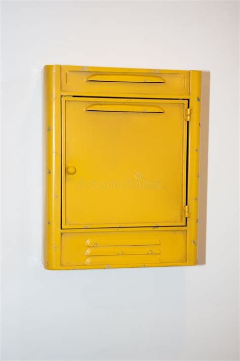 Close Up Photo Of Vintage Yellow Mail Box With Empty Sign Stock Image