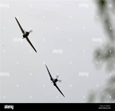 A Battle Of Britain Memorial Flight Flypast Of A Spitfire And A