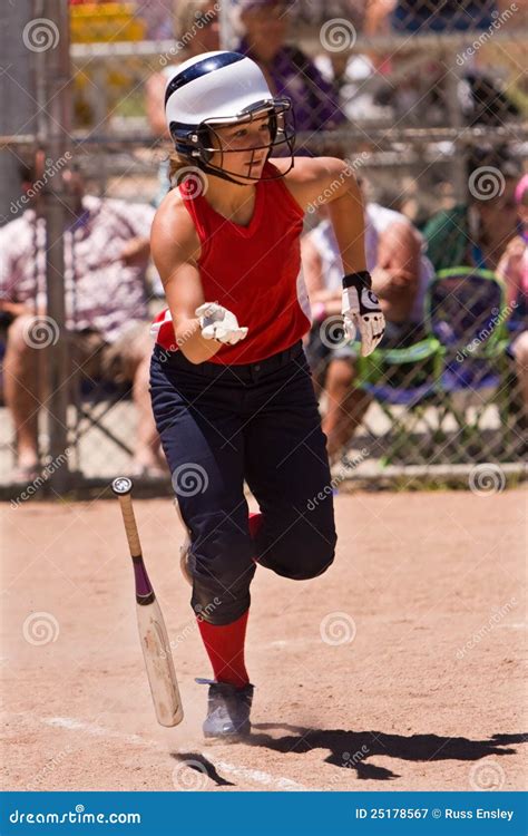 Softball Player Sliding Into Home Plate Royalty Free Stock Photography