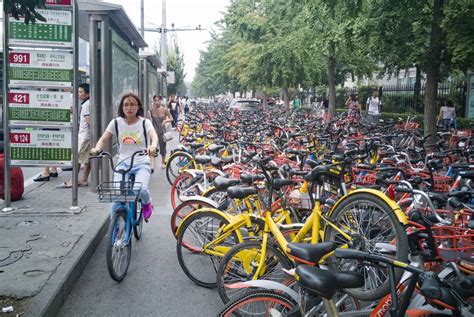 Bike Share Oversupply In China Huge Piles Of Abandoned And Broken