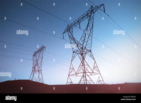 The evening electricity pylon silhouette Stock Photo - Alamy