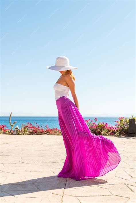 Free Photo Beautiful Woman Wearing Hat And Pink Skirt